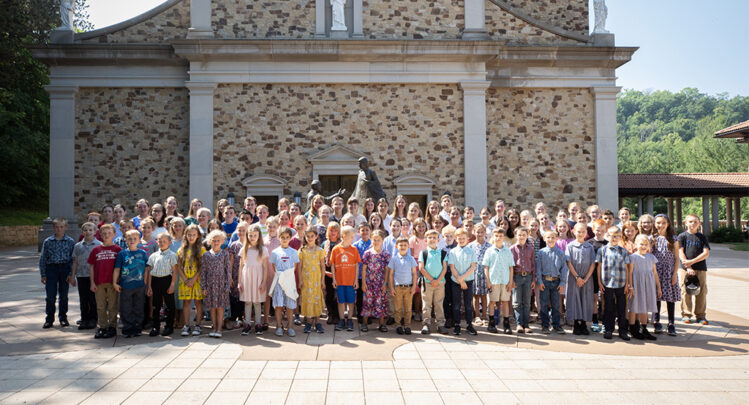 A group photo of young children in front of the Shrine Church in La Crosse, Wisconsin.