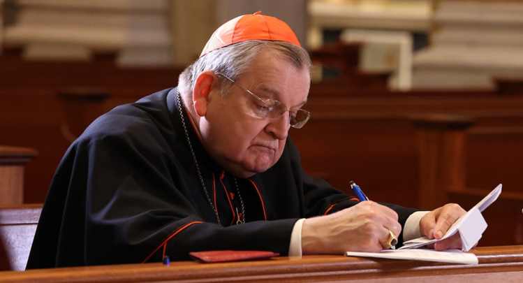 Raymond Leo Cardinal Burke signing the Dubia Submitted to Pope Francis in the church of Our Lady of Guadalupe Shrine in La Crosse, Wisconsin.