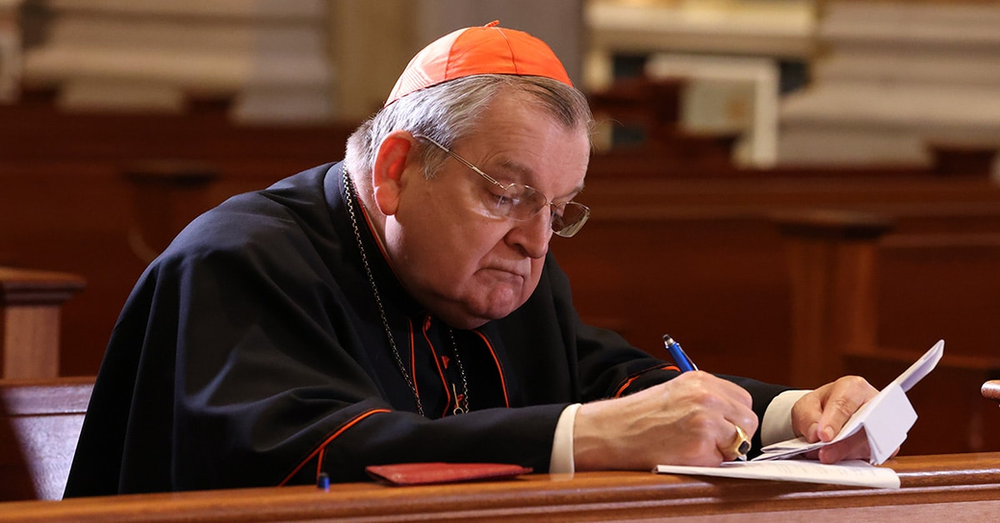 Raymond Leo Cardinal Burke signing the Dubia Submitted to Pope Francis in the church of Our Lady of Guadalupe Shrine in La Crosse, Wisconsin.