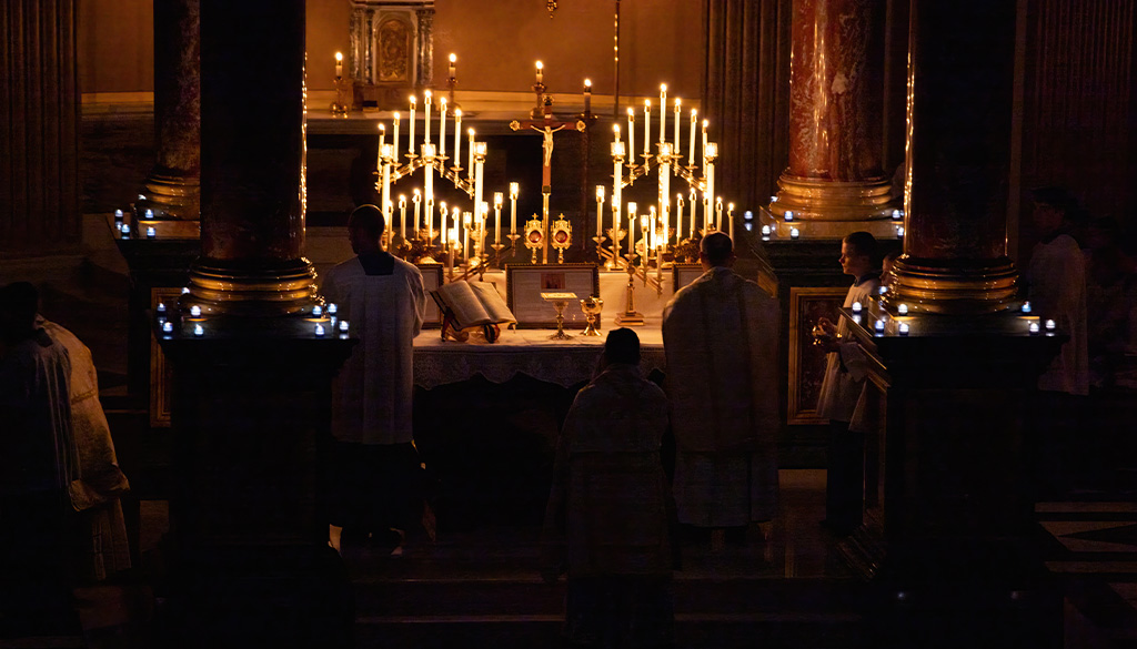 Shrine altar lit by candles during the Rorate Caeli Mass