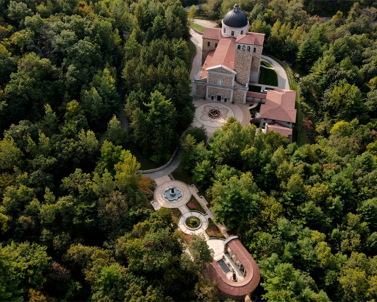 Aerial of the forest surrounding the grounds of Our Lady of Guadalupe Shrine in La Crosse, Wisconsin.