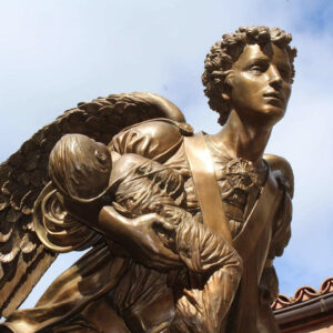 Statue of an angel carrying a baby at Our Lady of Guadalupe Shrine in La Crosse, Wisconsin.