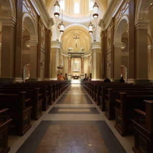 Pews leading to the altar of the church at Our Lady of Guadalupe Shrine in La Crosse, Wisconsin.