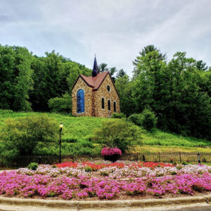 The Votive Candle Chapel exterior on top of a hill at Our Lady of Guadalupe Shrine in La Crosse, Wisconsin.