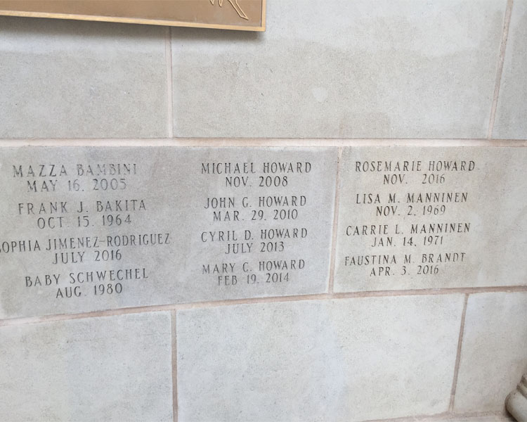 Family names inscribed on the wall in the Memorial to the Unborn at The Shrine of Our Lady of Guadalupe in La Crosse, Wisconsin.