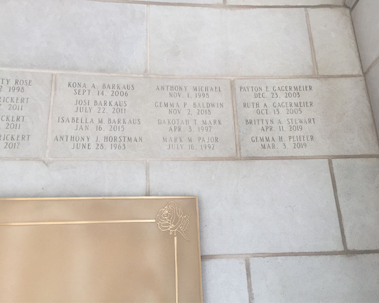 Inscription wall of names of the deceased in the Memorial to the Unborn at The Shrine of Our Lady of Guadalupe in La Crosse, Wisconsin.