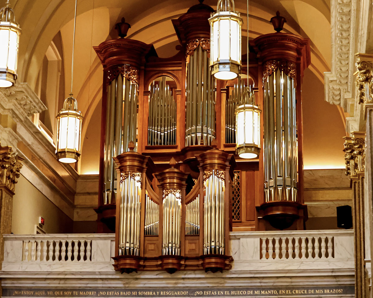 Lights hanging over the organ pipes in the church of Our Lady of Guadalupe Shrine in La Crosse, Wisconsin.