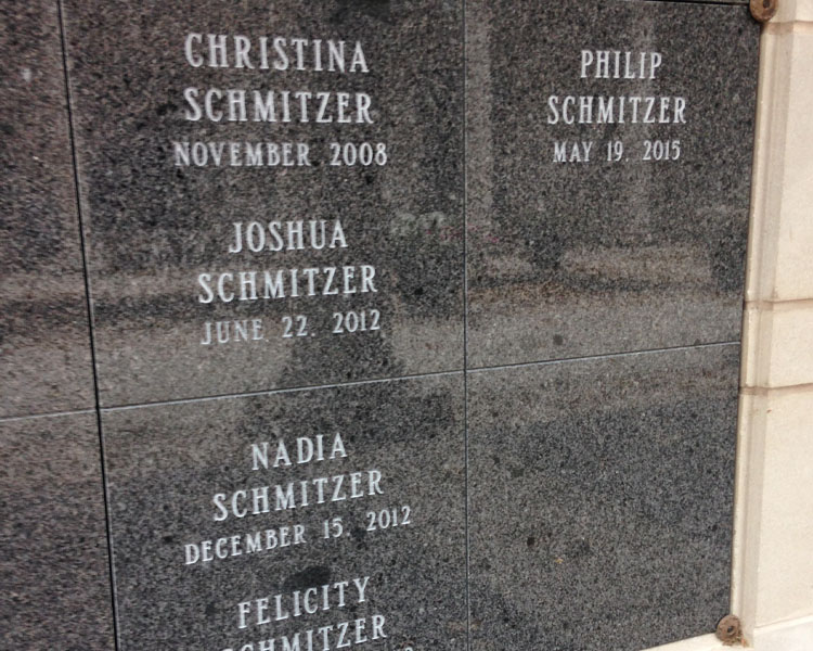 Names of the Schmitzer family on a tomb in the Memorial to the Unborn at The Shrine of Our Lady of Guadalupe in La Crosse, Wisconsin.