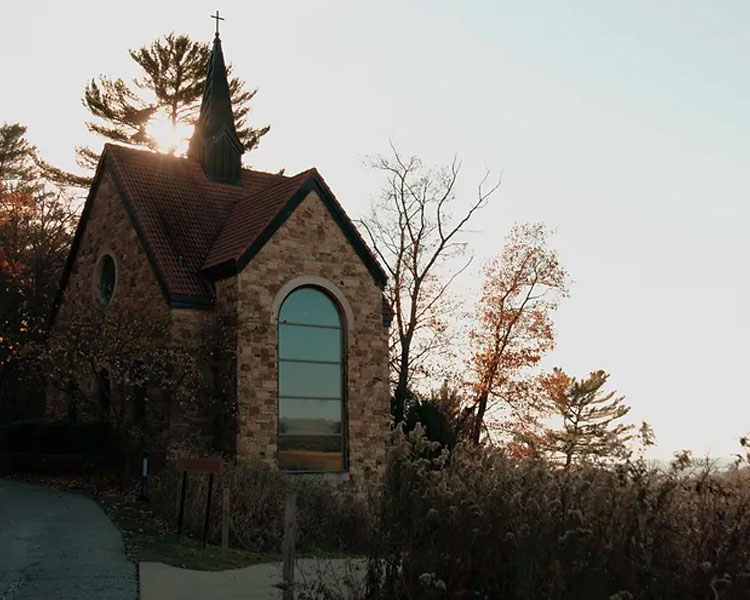 Exterior of the Votive Candle Chapel in the evening at Our Lady of Guadalupe Shrine in La Crosse, Wisconsin.