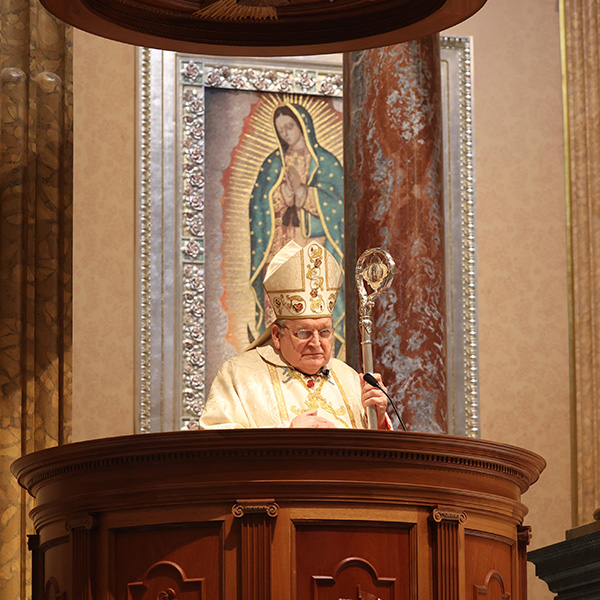 Cardinal Burke at the altar in the Shrine Church.