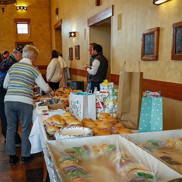 A dessert table featuring Mardi Gras treats at the chili cookoff, hosted at the Shrine in La Crosse, Wisconsin.