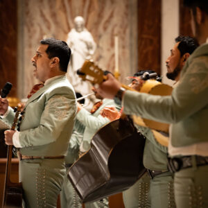 A group of Mariachi musicians playing in the Shrine church.