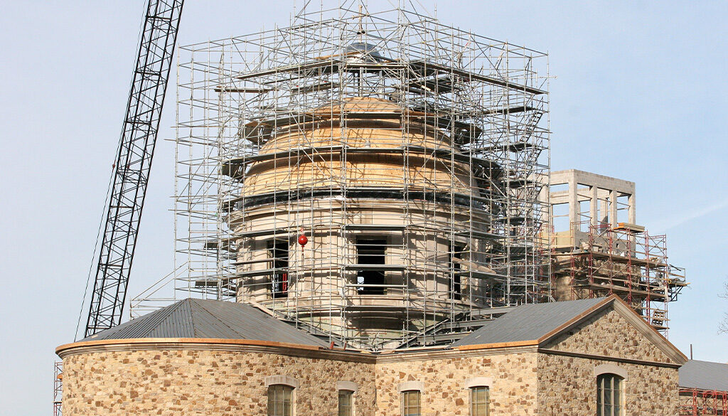 Outside construction on the Shrine Church dome.