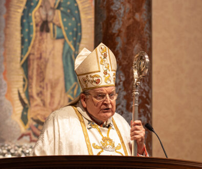 Cardinal Burke at the altar in the Shrine Church La Crosse, WI