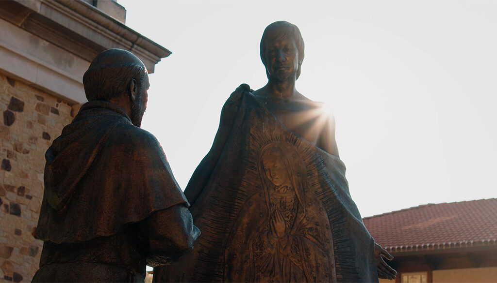 A plaza statue of St. Juan Diego presenting Tilma to the bishop.