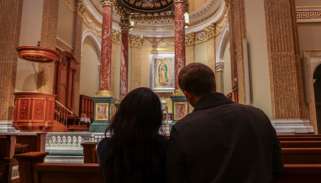 Married couple praying at the Guadalupe Shrine in La Crosse, WILove and Sacrifice