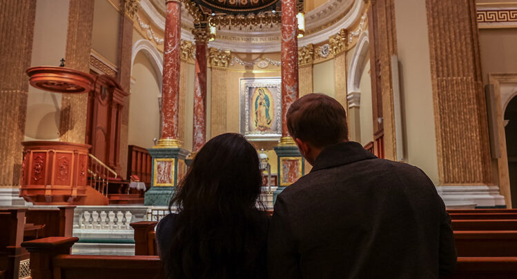 Married couple praying at the Guadalupe Shrine in La Crosse, WILove and Sacrifice