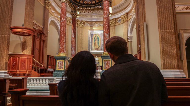 Married couple praying at the Guadalupe Shrine in La Crosse, WILove and Sacrifice