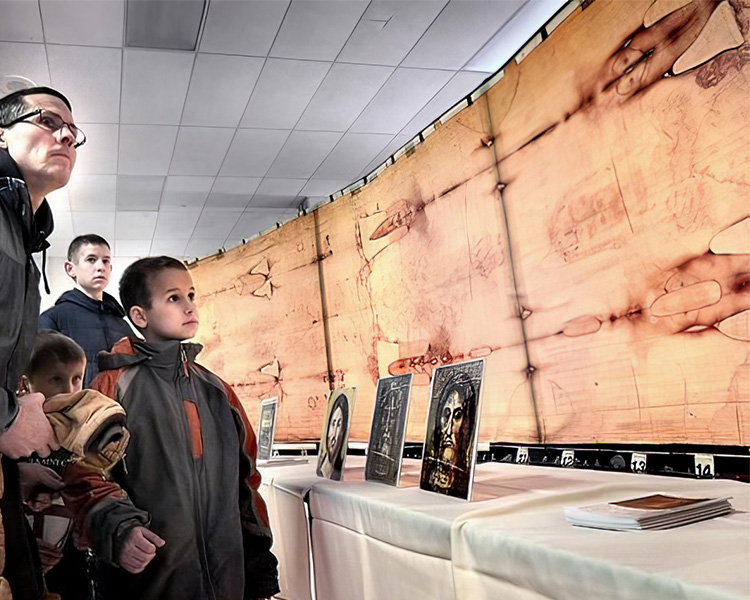 Family admiring the Shroud of Turin Replica Exhibit in La Crosse, WI