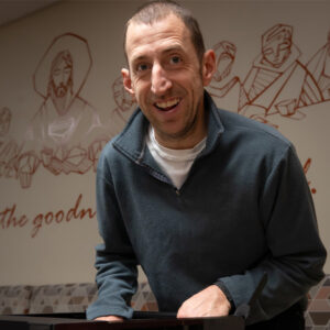 Christopher Pundzak gladly building PC computers at the shrine of Our lady of Guadalupe Staff