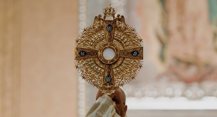 Adoration of Christ's real presence in the Eucharist.