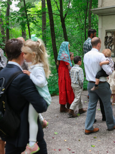 Fathers with their children for church