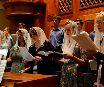 Chant Camp students singing for Mass in the Guadalulpe Shrine choir loft