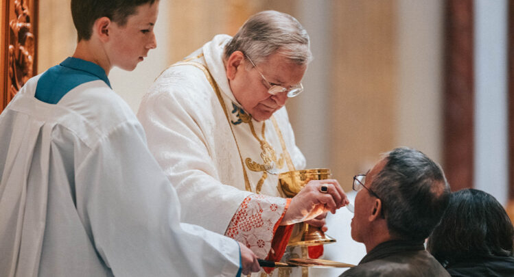 Cardinal Burke Distributing Holy Communion at the Guadalupe Shrine