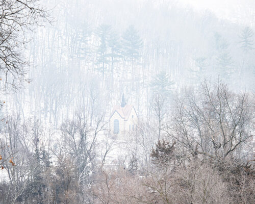 Snow covered bluffs and Shrine Chapel La Crosse Wisconisn