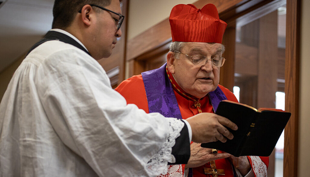 Cardinal Burke praying prayers of exorcism before blessing the Shrine grounds