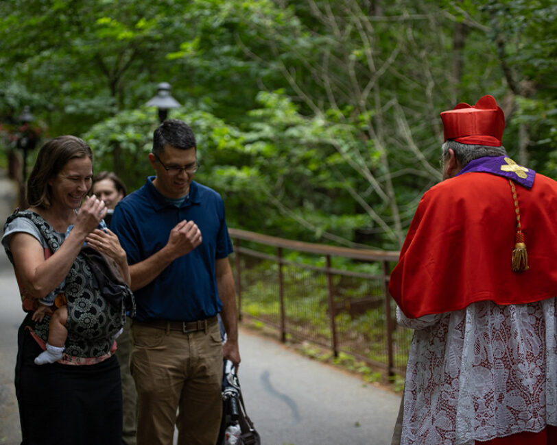 Couple getting blessed on the pilgrim path