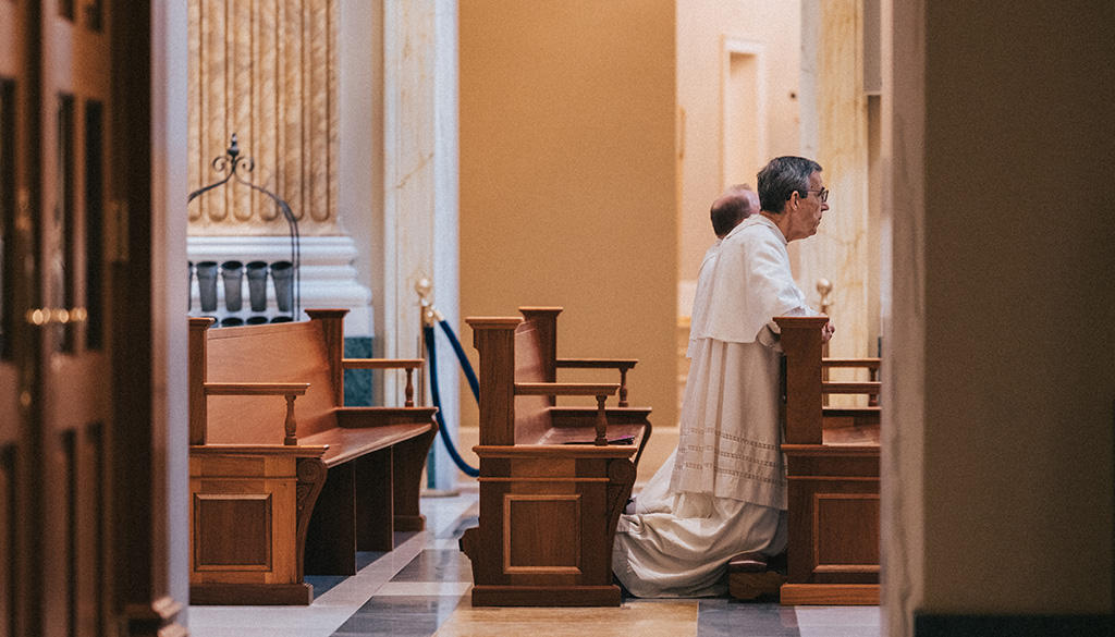 priests praying Guadalupe Shrine