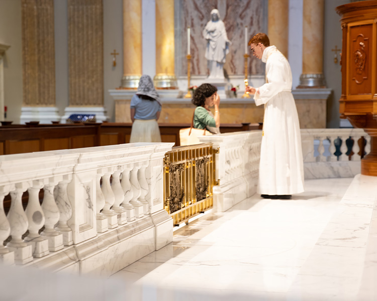 Relic Veneration at the altar rail after Mass at the Guadalupe Shrine