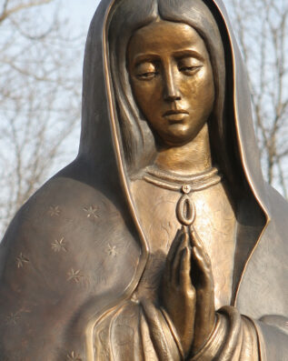 Mary's merciful gaze Guadalupe Shrine Plaza Statue