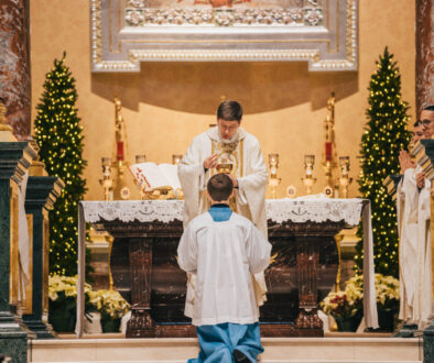 Bishop Vitalii Kryvytskyi distributing Communion duringHoly Mass