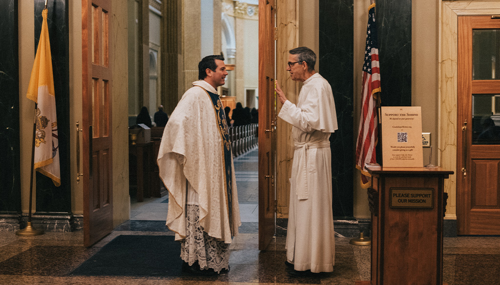 Padre Ravasi speaking after Mass with Norbertine Prior, Father Hildebrand