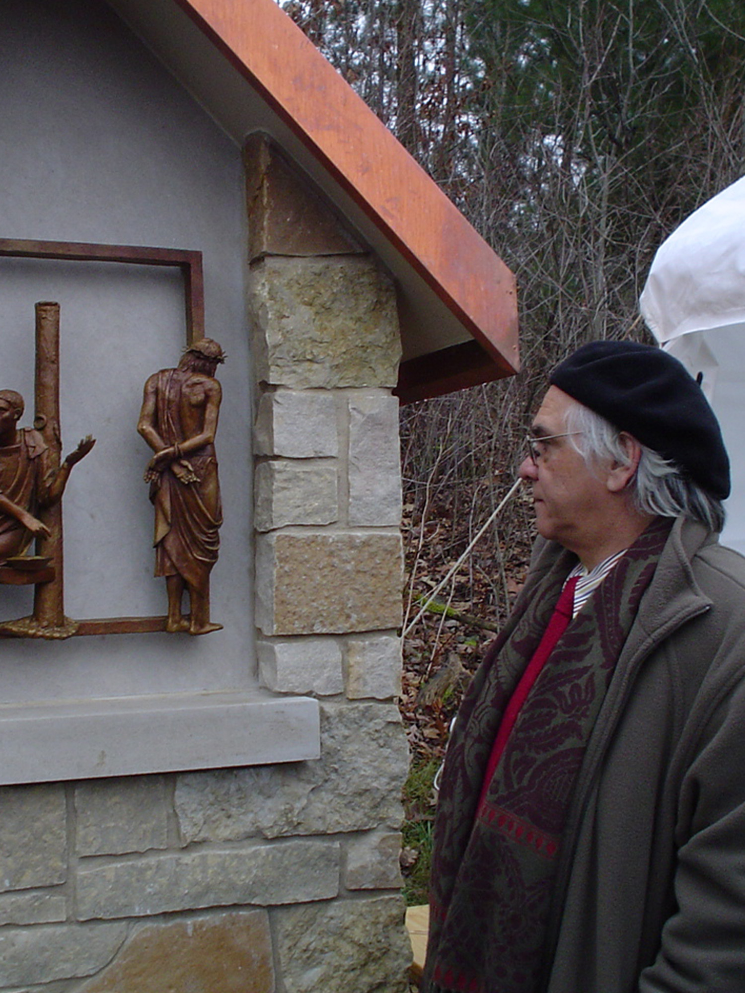 Anthony Visco stands by the Stations of the Cross.